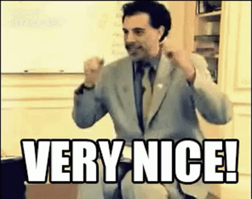 Animated meme: Borat raising both fists, captioned “Very nice!”