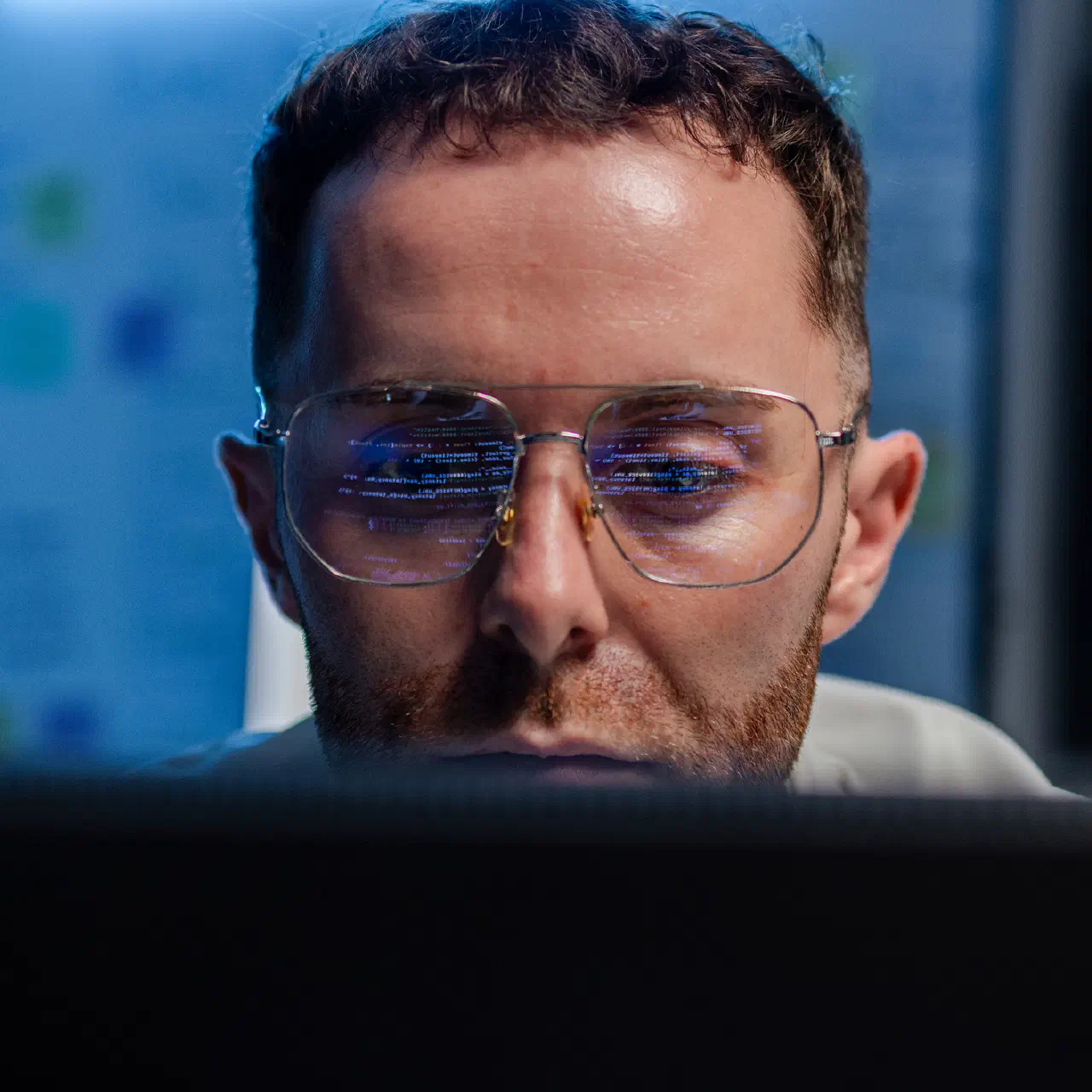 A researcher working at a computer.